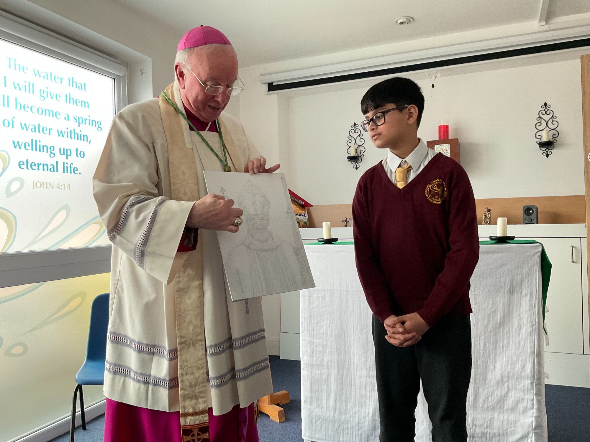 A pupil presenting the Bishop with a drawing